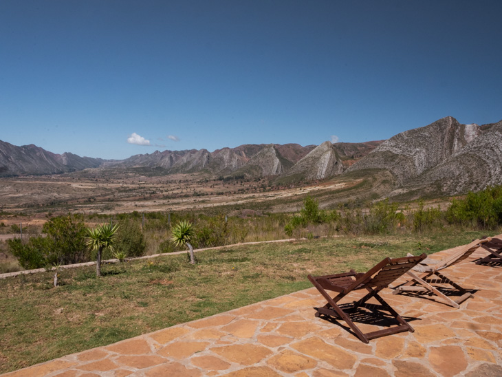 Two deckchairs on a terrace overlooking the Torotoro landscape, Bolivia