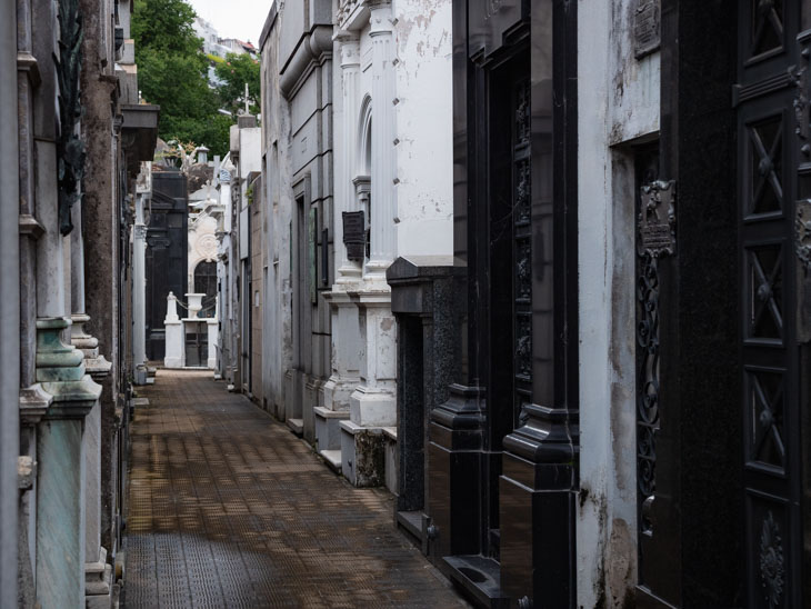 An alleyway of huge mausoleums in Recoleta Cementerio, Buenos Aires, Argentina