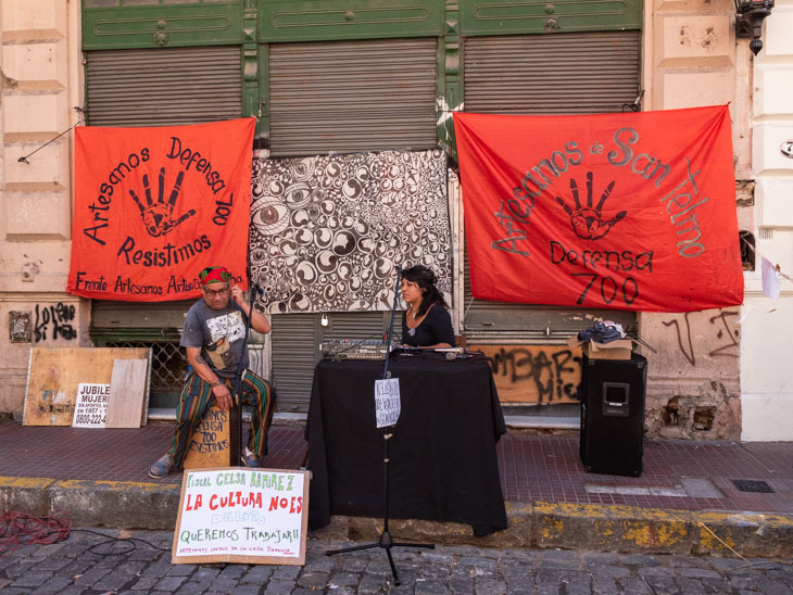 A man and woman perform on a San Telmo street at the Sunday market, Buenos Aires, Argentina