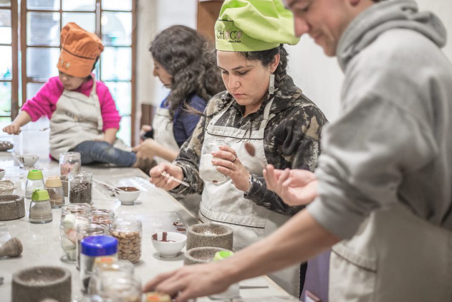 Cusco's chocolate museum - Chocolate workshop participants in action at the ChocoMuseo