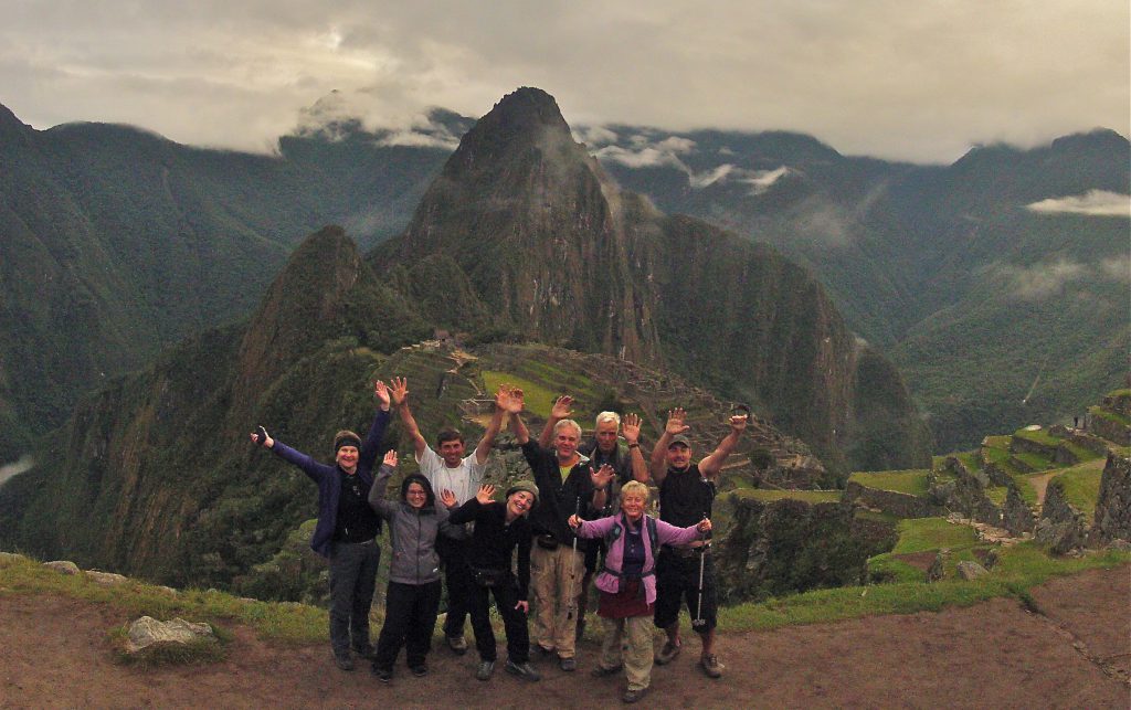 Inca Jungle Trail - Trekkers celebrate being at Machu Picchu.