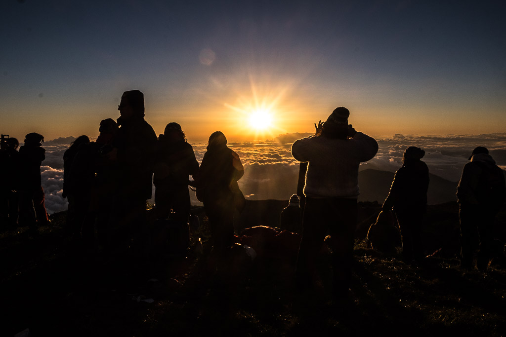 Crowds gather to watch the sunrise at Tres Cruces