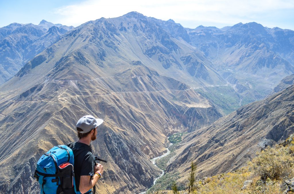 Colca Canyon trek - Trekker overlooking Colca Canyon.